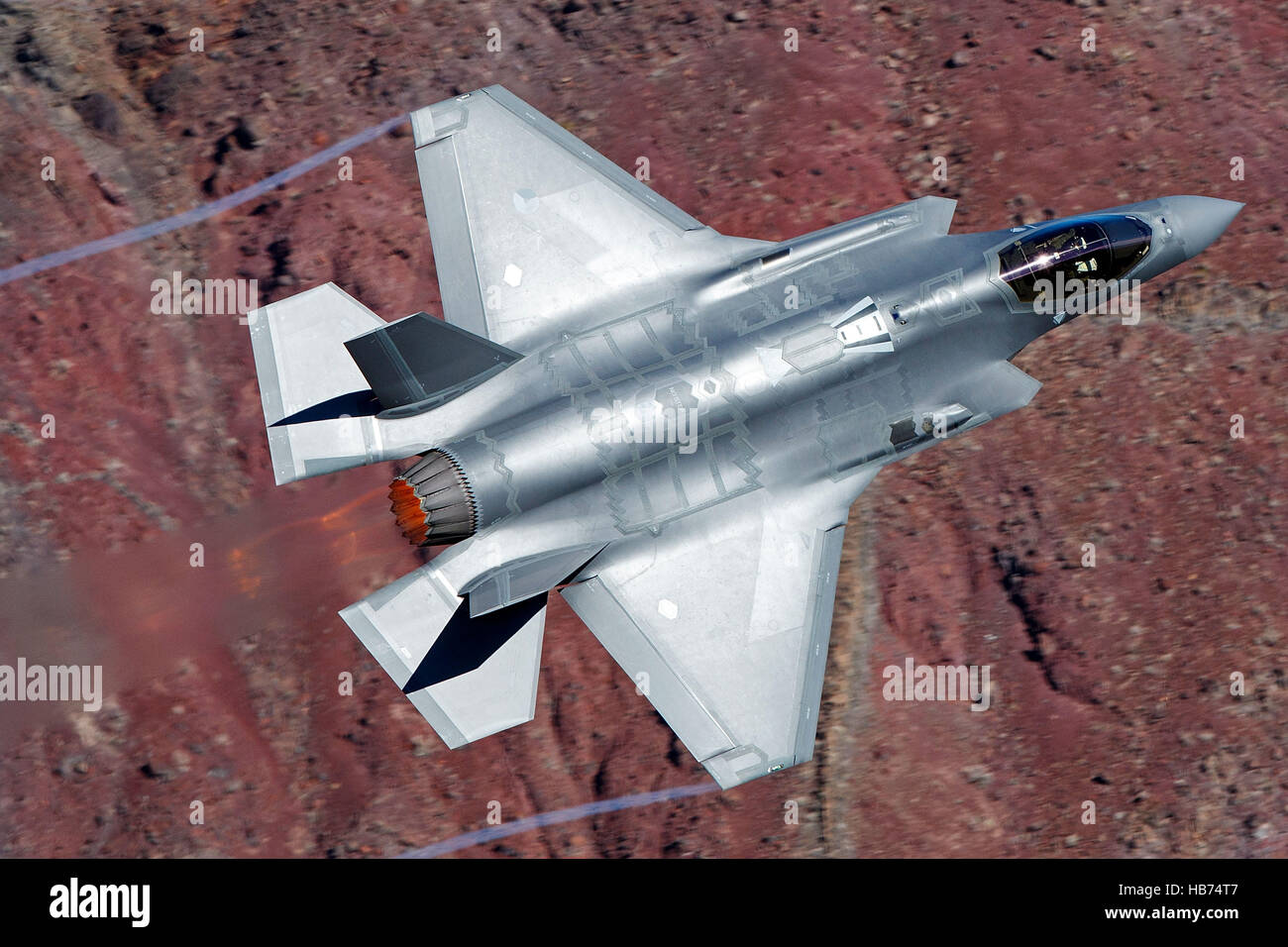 Lockheed Martin F-35A Lighting II from the 323 Squadron, Royal Netherlands Air Force, flies low level through the Jedi Transition, Star Wars Canyon, Death Valley National Park, California, United States of America Stock Photo