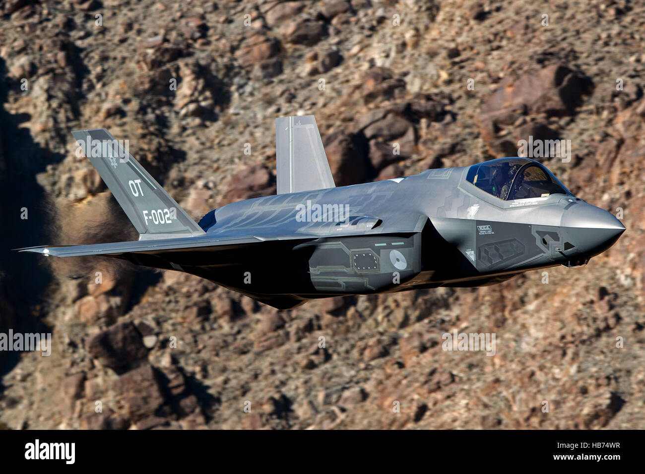 Lockheed Martin F-35A Lighting II from the 323 Squadron, Royal Netherlands Air Force, flies low level through the Jedi Transition, Star Wars Canyon, Death Valley National Park, California, United States of America Stock Photo