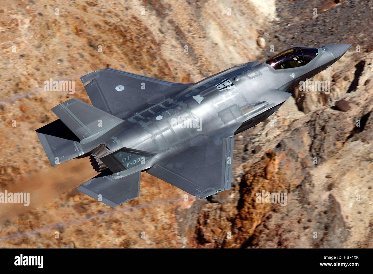 Lockheed Martin F-35A Lighting II from the 323 Squadron, Royal Netherlands Air Force, flies low level through the Jedi Transition, Star Wars Canyon, Death Valley National Park, California, United States of America Stock Photo