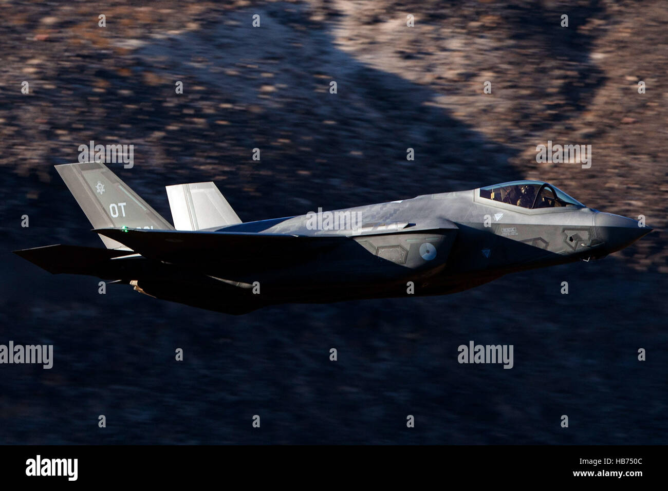 Lockheed Martin F-35A Lighting II from the 323 Squadron, Royal Netherlands Air Force, flies low level through the Jedi Transition, Star Wars Canyon, Death Valley National Park, California, United States of America Stock Photo