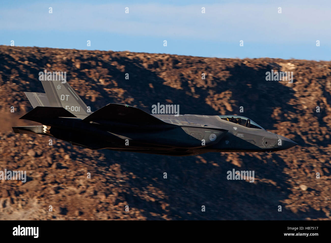 Lockheed Martin F-35A Lighting II from the 323 Squadron, Royal Netherlands Air Force, flies low level through the Jedi Transition, Star Wars Canyon, Death Valley National Park, California, United States of America Stock Photo