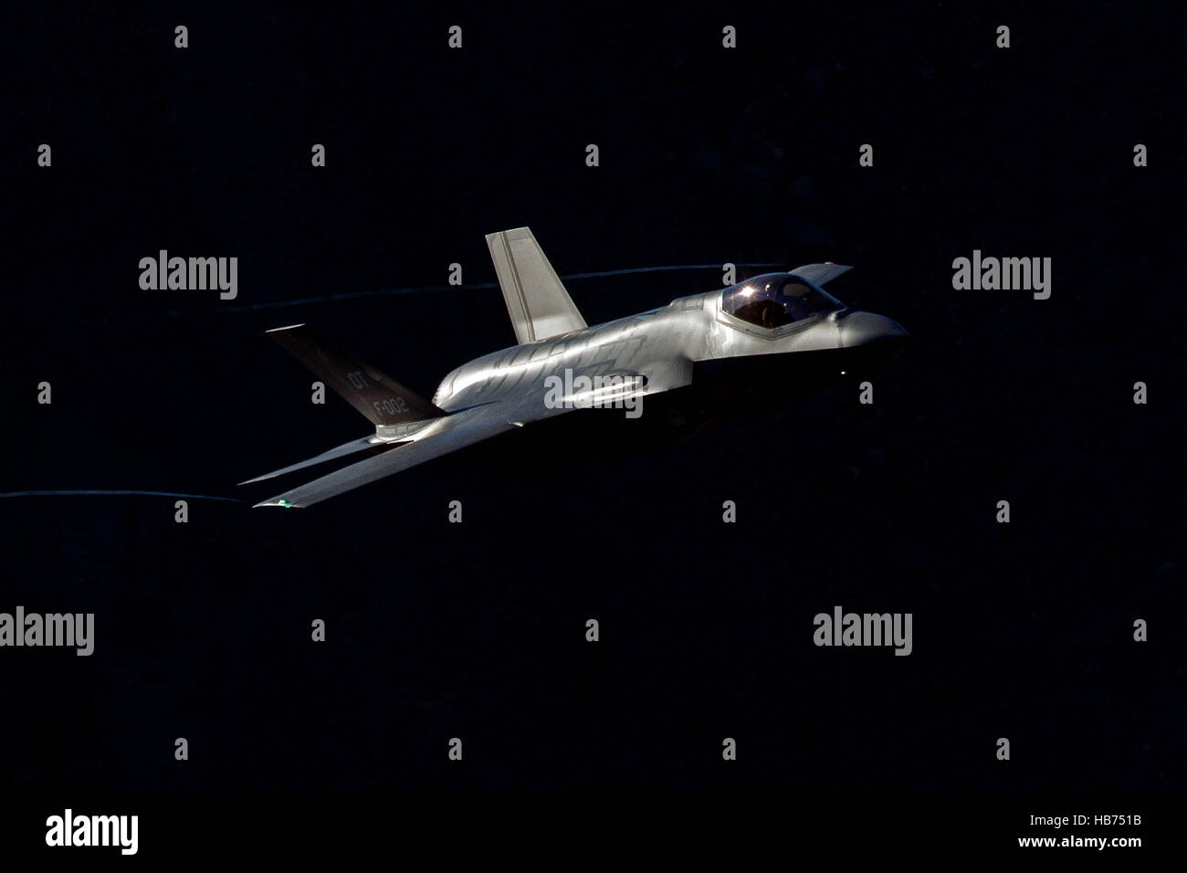 Lockheed Martin F-35A Lighting II from the 323 Squadron, Royal Netherlands Air Force, flies low level through the Jedi Transition, Star Wars Canyon, Death Valley National Park, California, United States of America Stock Photo