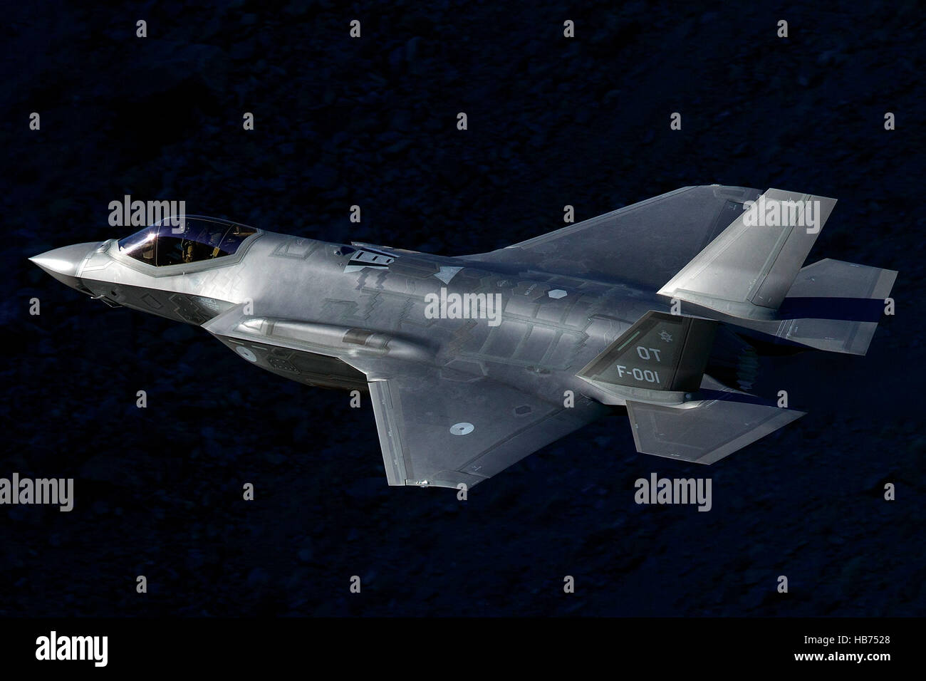 Lockheed Martin F-35A Lighting II from the 323 Squadron, Royal Netherlands Air Force, flies low level through the Jedi Transition, Star Wars Canyon, Death Valley National Park, California, United States of America Stock Photo