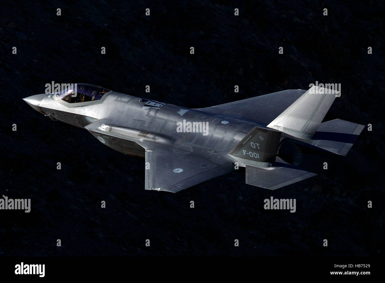 Lockheed Martin F-35A Lighting II from the 323 Squadron, Royal Netherlands Air Force, flies low level through the Jedi Transition, Star Wars Canyon, Death Valley National Park, California, United States of America Stock Photo