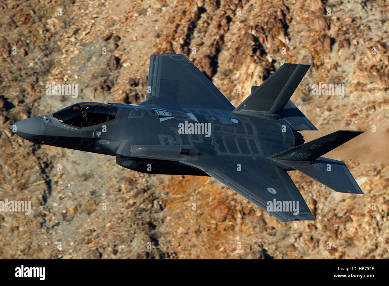 Lockheed Martin F-35A Lighting II from the 323 Squadron, Royal Netherlands Air Force, flies low level through the Jedi Transition, Star Wars Canyon, Death Valley National Park, California, United States of America Stock Photo