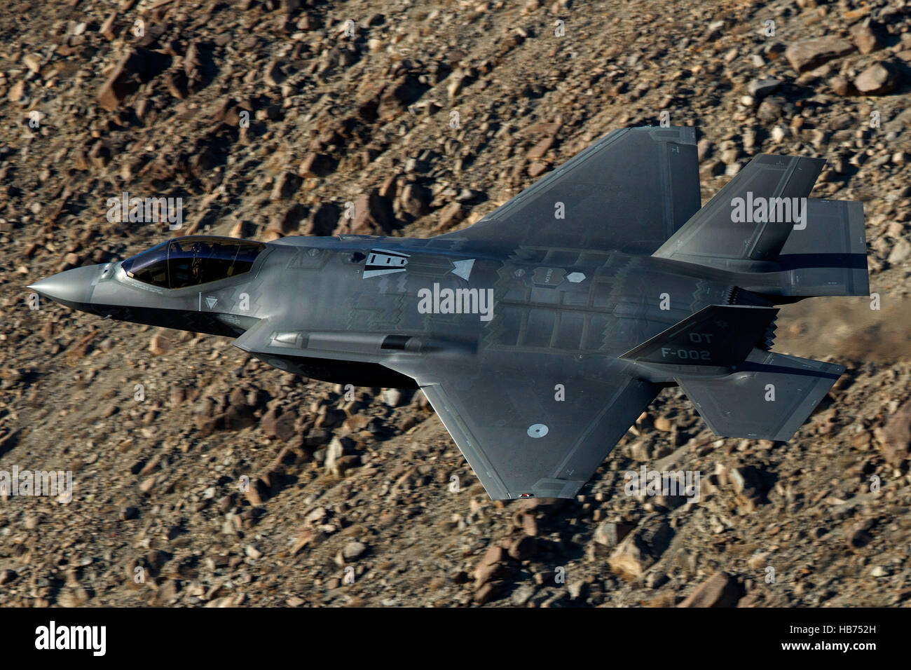 Lockheed Martin F-35A Lighting II from the 323 Squadron, Royal Netherlands Air Force, flies low level through the Jedi Transition, Star Wars Canyon, Death Valley National Park, California, United States of America Stock Photo