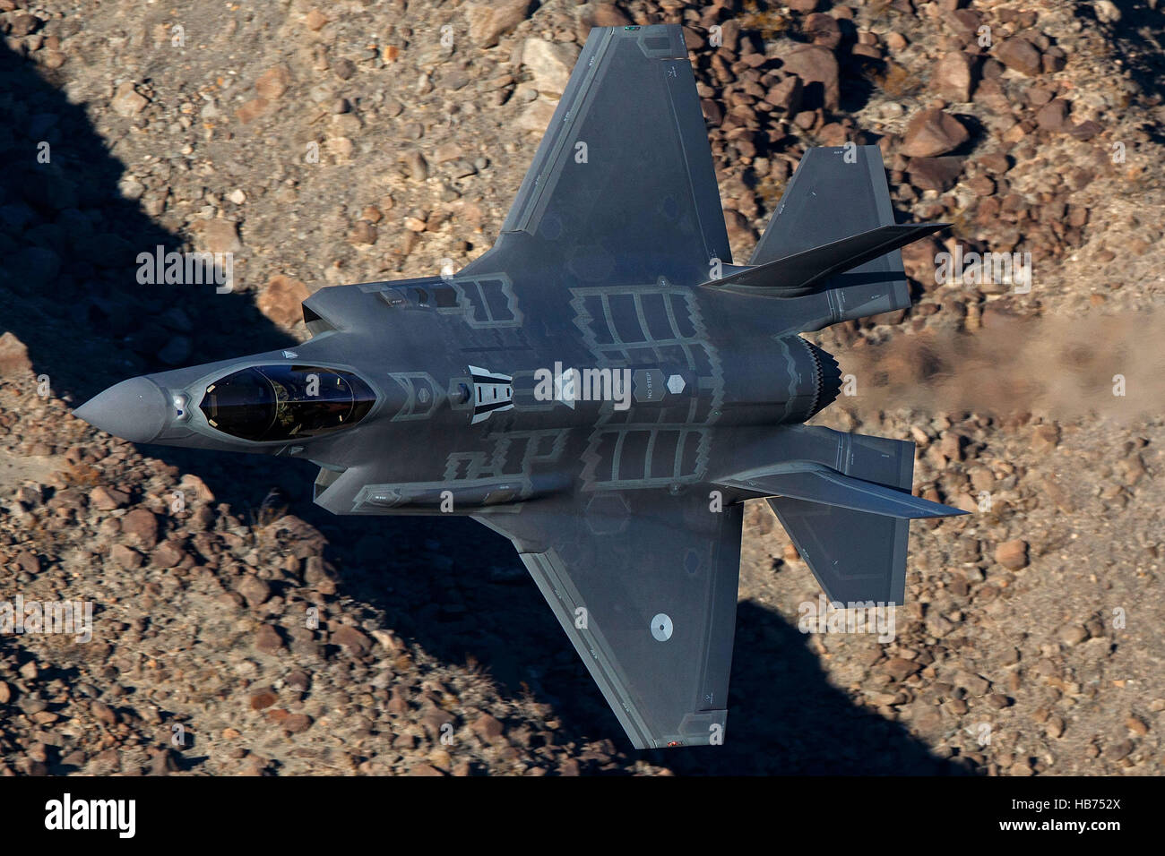 Lockheed Martin F-35A Lighting II from the 323 Squadron, Royal Netherlands Air Force, flies low level through the Jedi Transition, Star Wars Canyon, Death Valley National Park, California, United States of America Stock Photo