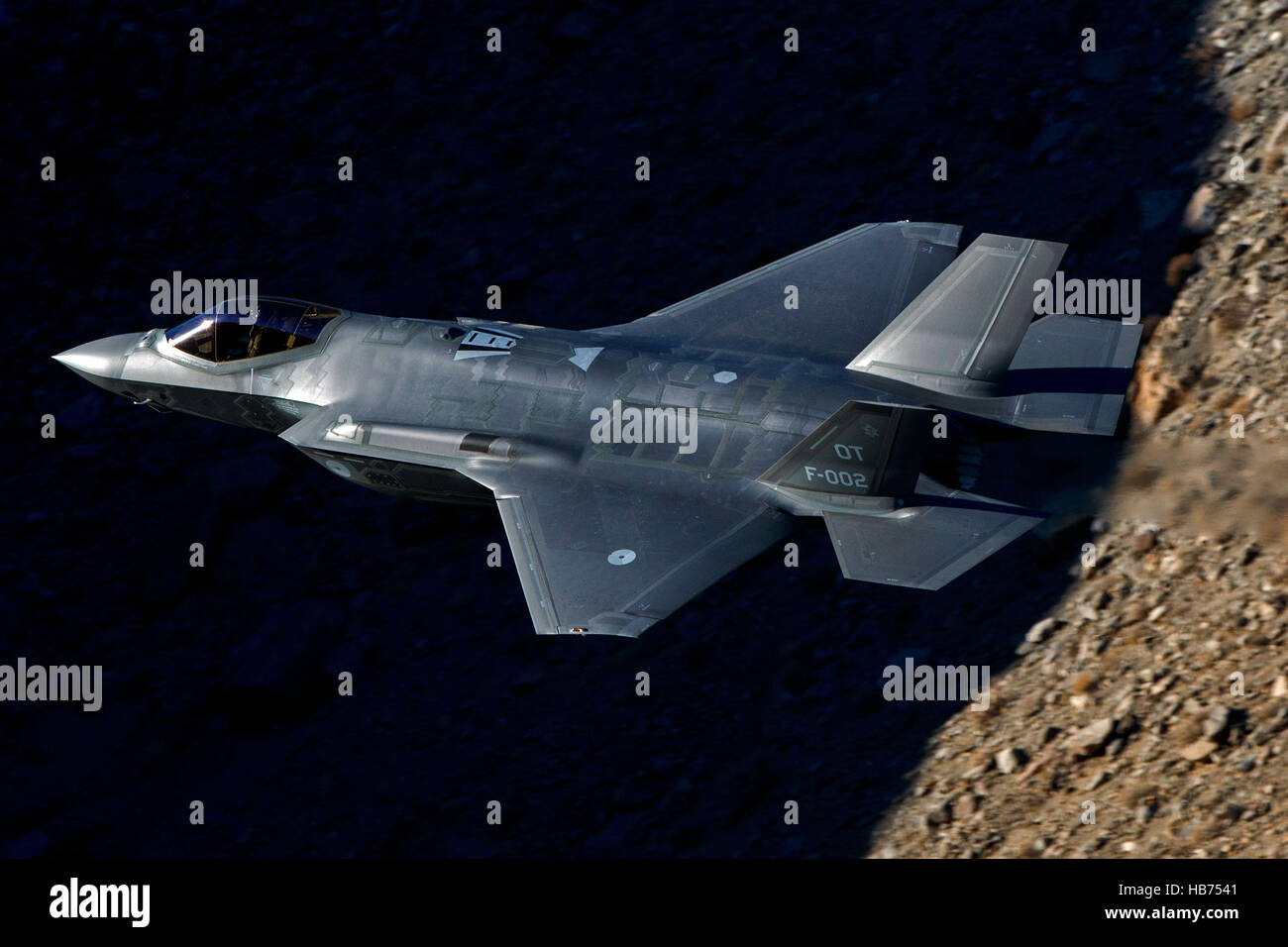 Lockheed Martin F-35A Lighting II from the 323 Squadron, Royal Netherlands Air Force, flies low level through the Jedi Transition, Star Wars Canyon, Death Valley National Park, California, United States of America Stock Photo