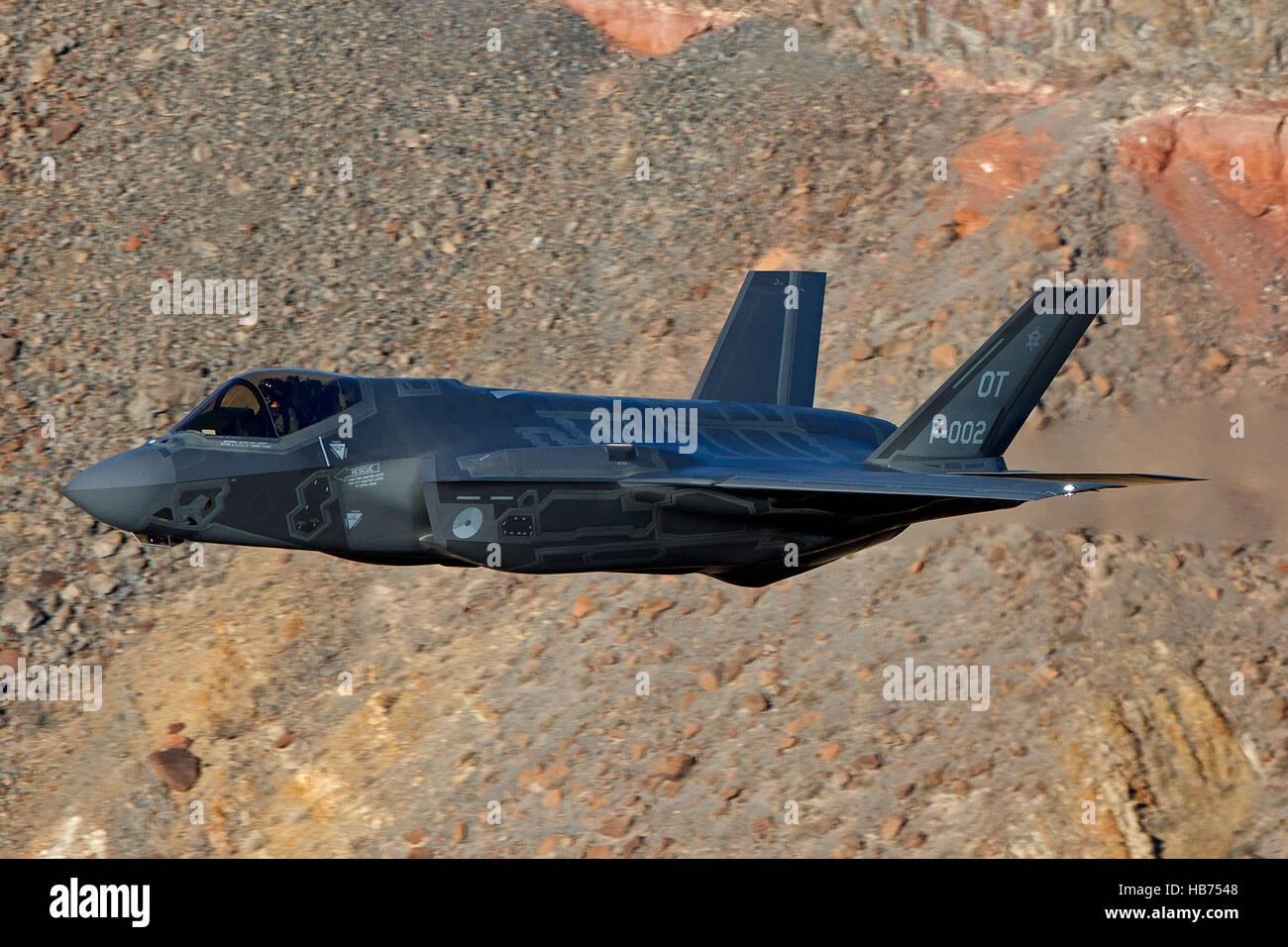 Lockheed Martin F-35A Lighting II from the 323 Squadron, Royal Netherlands Air Force, flies low level through the Jedi Transition, Star Wars Canyon, Death Valley National Park, California, United States of America Stock Photo
