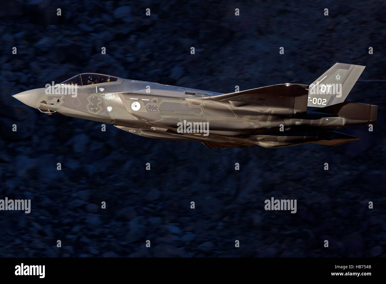 Lockheed Martin F-35A Lighting II from the 323 Squadron, Royal Netherlands Air Force, flies low level through the Jedi Transition, Star Wars Canyon, Death Valley National Park, California, United States of America Stock Photo