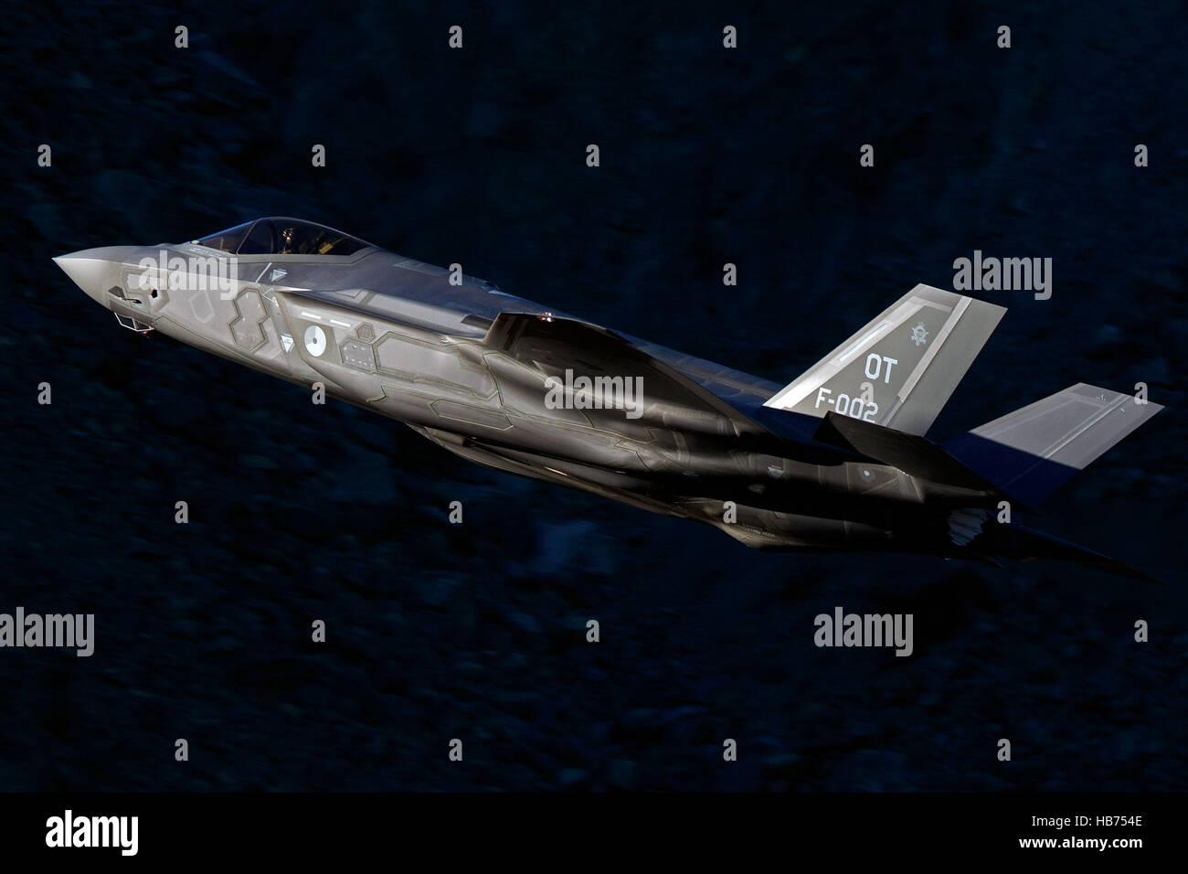 Lockheed Martin F-35A Lighting II from the 323 Squadron, Royal Netherlands Air Force, flies low level through the Jedi Transition, Star Wars Canyon, Death Valley National Park, California, United States of America Stock Photo