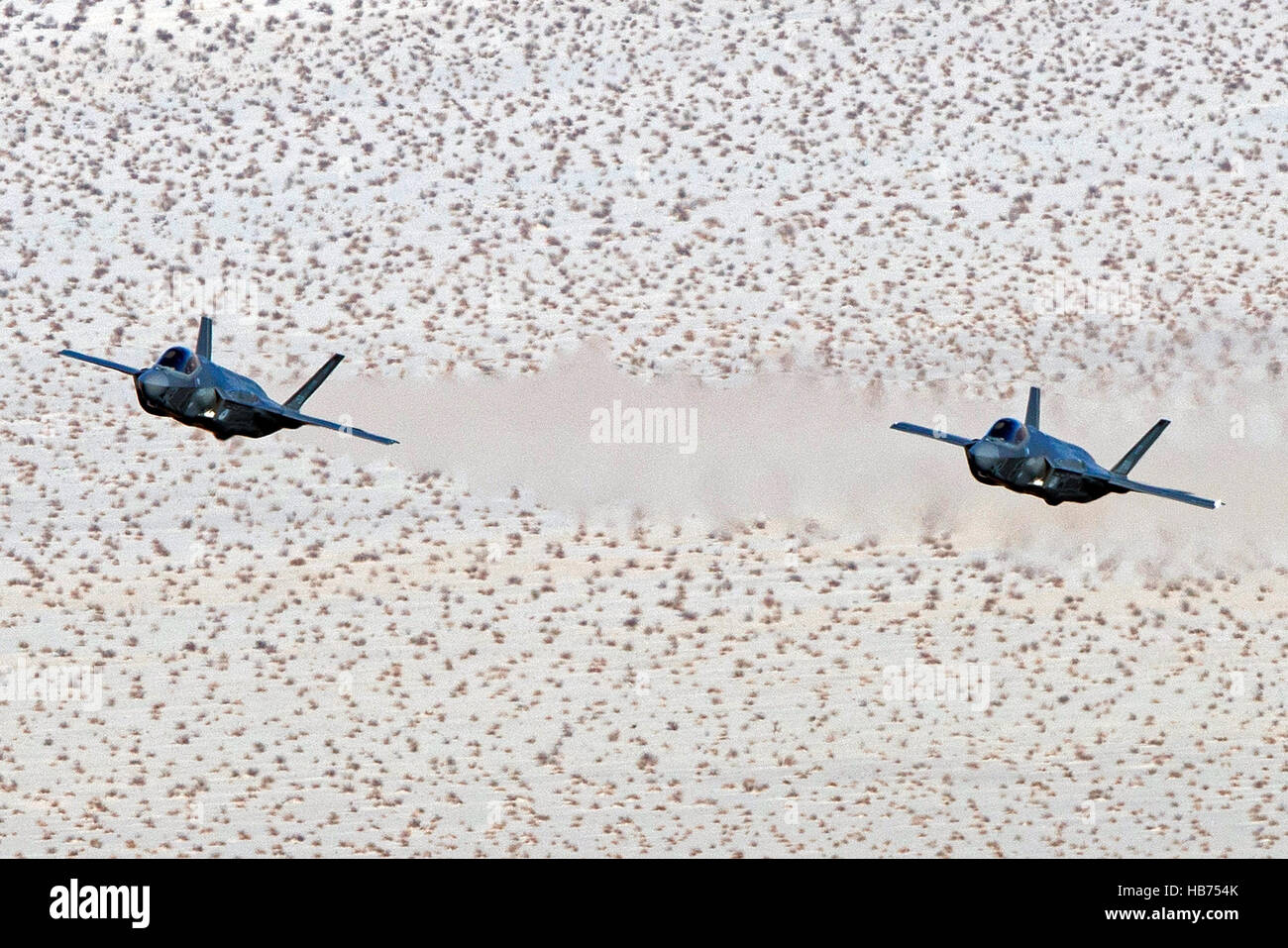 Lockheed Martin F-35A Lighting II from the 323 Squadron, Royal Netherlands Air Force, flies low level through the Jedi Transition, Star Wars Canyon, Death Valley National Park, California, United States of America Stock Photo