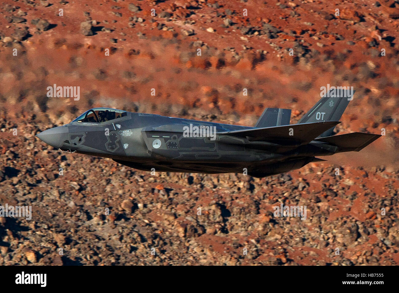 Lockheed Martin F-35A Lighting II from the 323 Squadron, Royal Netherlands Air Force, flies low level through the Jedi Transition, Star Wars Canyon, Death Valley National Park, California, United States of America Stock Photo