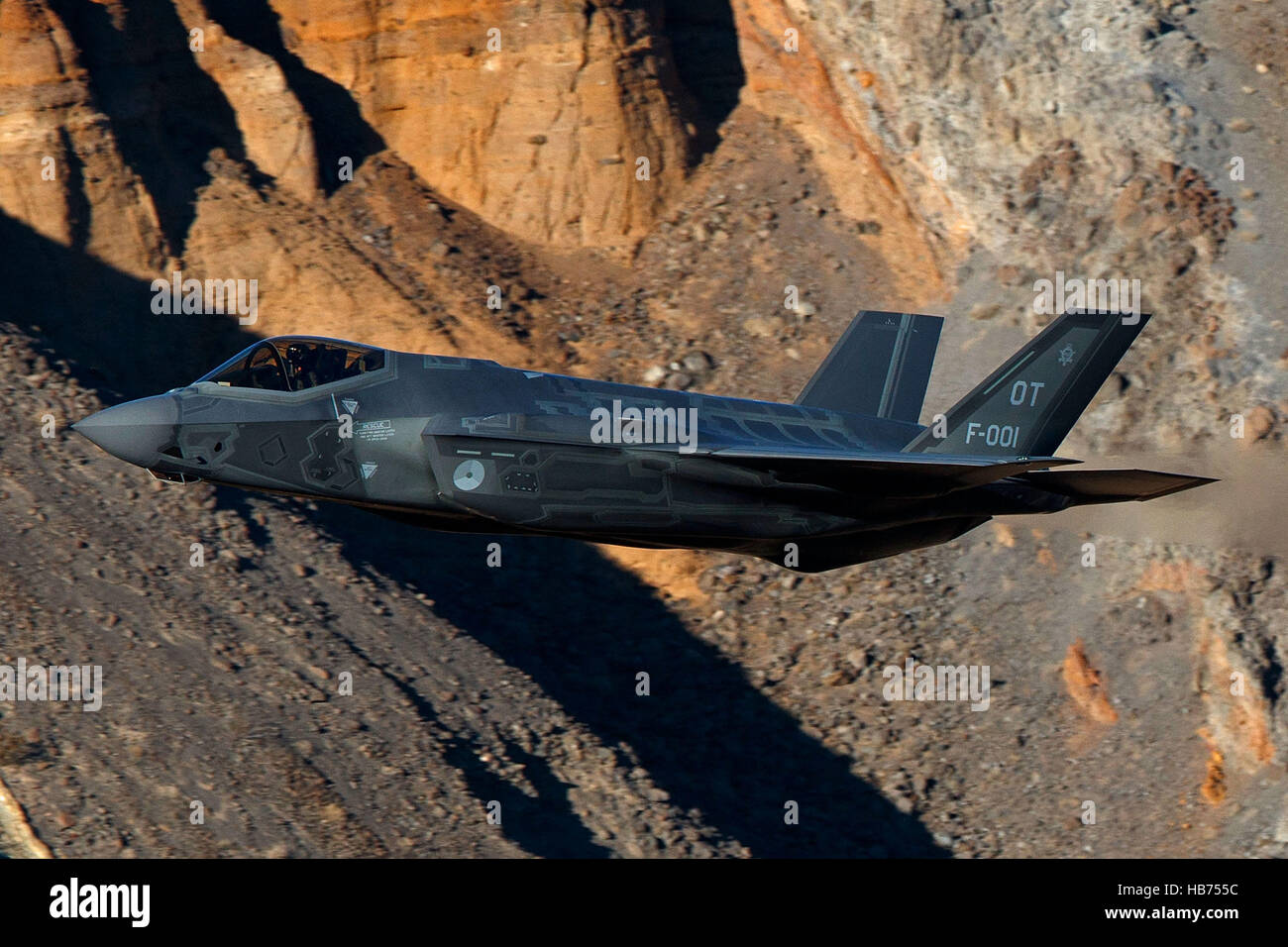 Lockheed Martin F-35A Lighting II from the 323 Squadron, Royal Netherlands Air Force, flies low level through the Jedi Transition, Star Wars Canyon, Death Valley National Park, California, United States of America Stock Photo