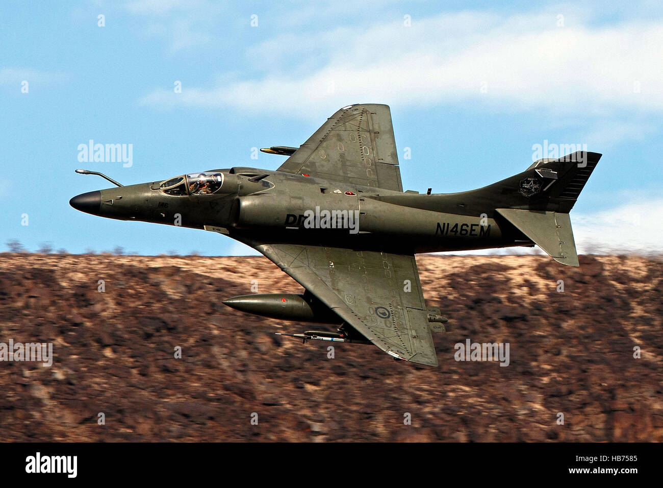 A Draken operated Douglas A-4K Skyhawk, flies low level through the Jedi Transition, Star Wars Canyon, Death Valley National Park, California, United States of America Stock Photo