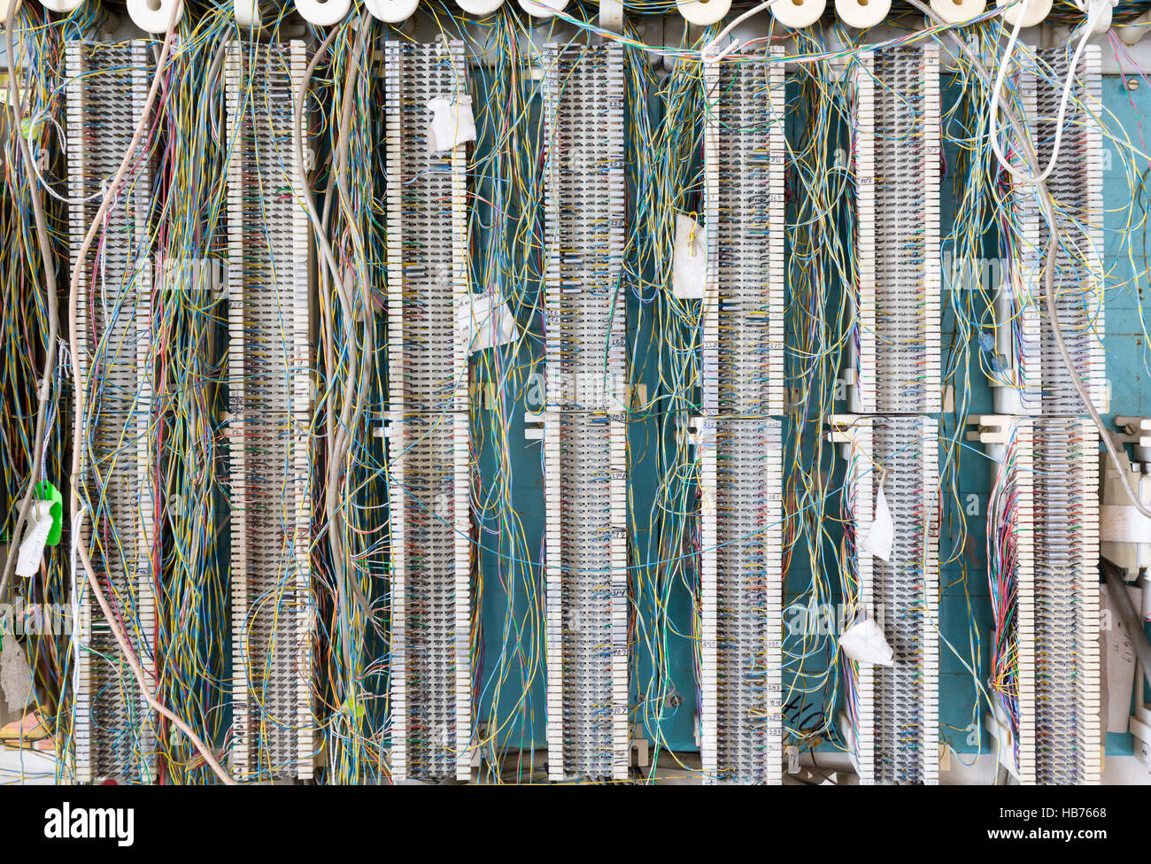 Telephone wiring panel on wall for telecoms Stock Photo