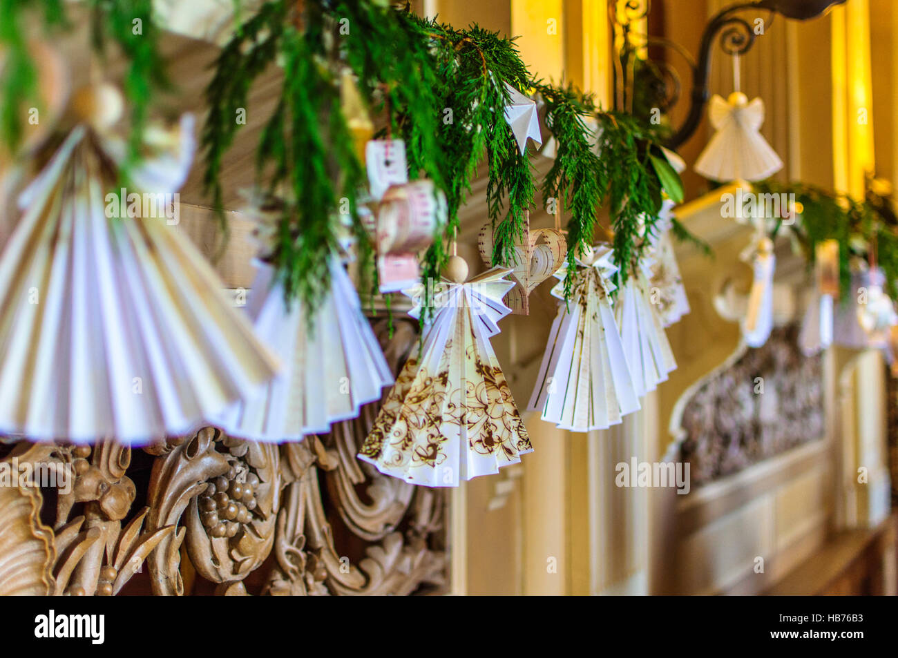 Edwardian handmade Christmas decorations, Angel on Christmas tree, Paper decorations Stock Photo