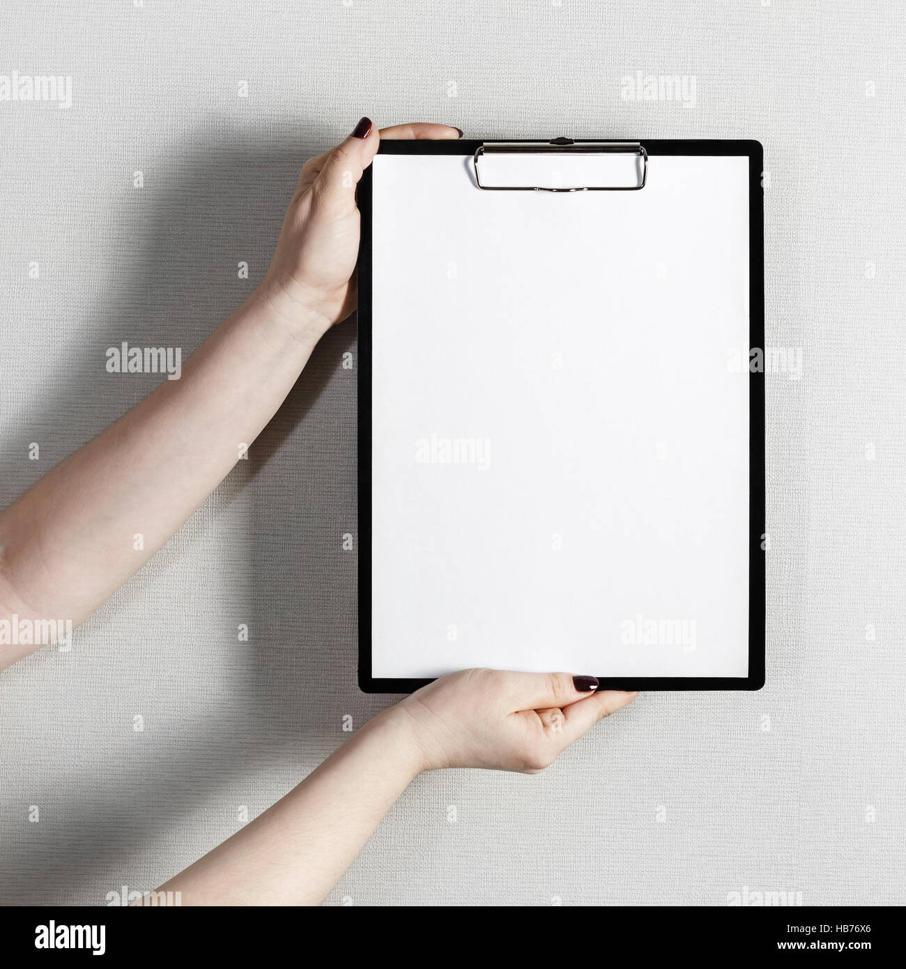 Hand Back Paper Blank paper in hands Stock Photo - Alamy