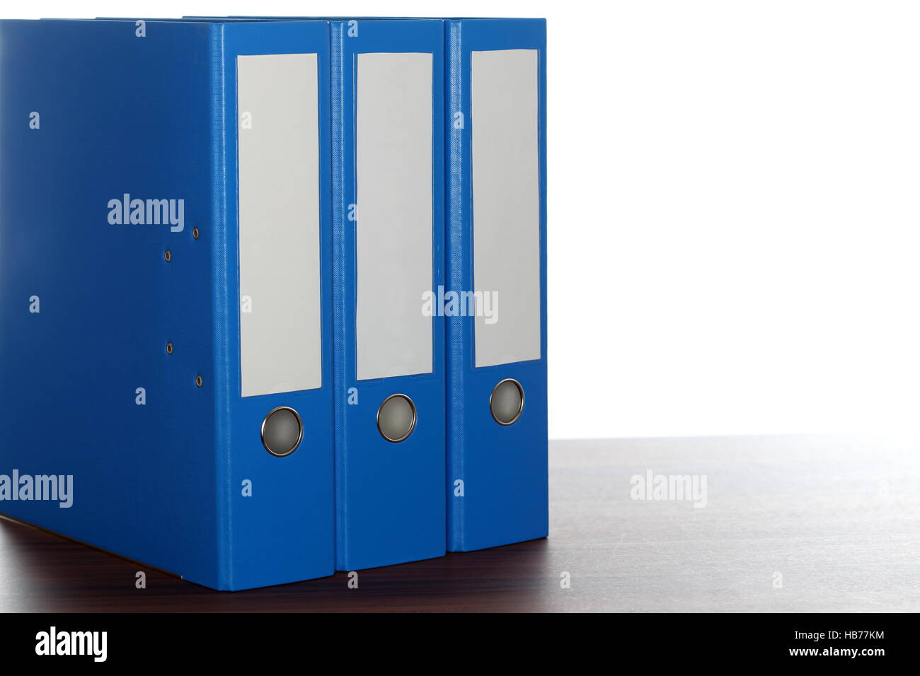 three blue folders Stock Photo - Alamy