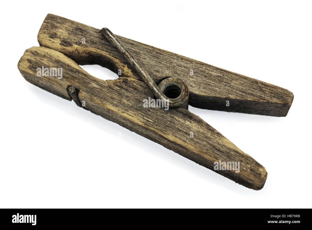 Decrepit wooden clothespin Stock Photo
