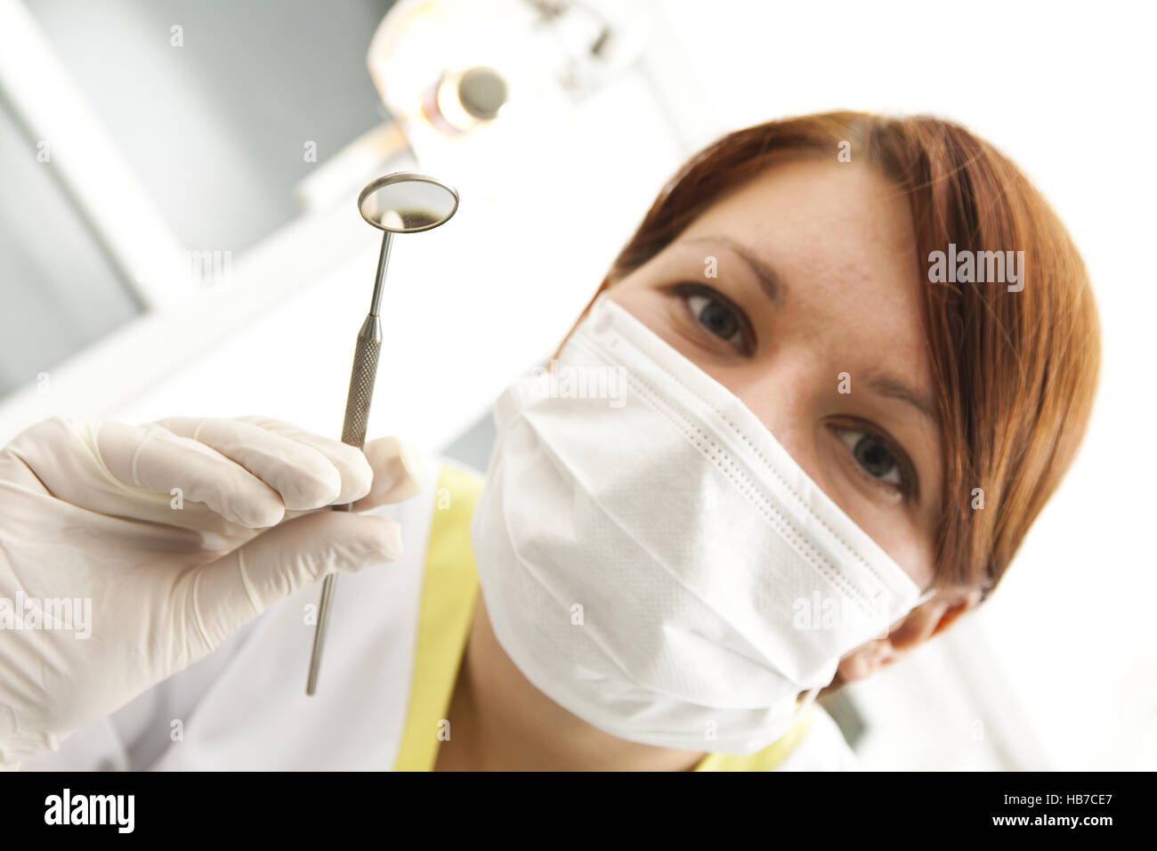young female dentist in examination Stock Photo Alamy