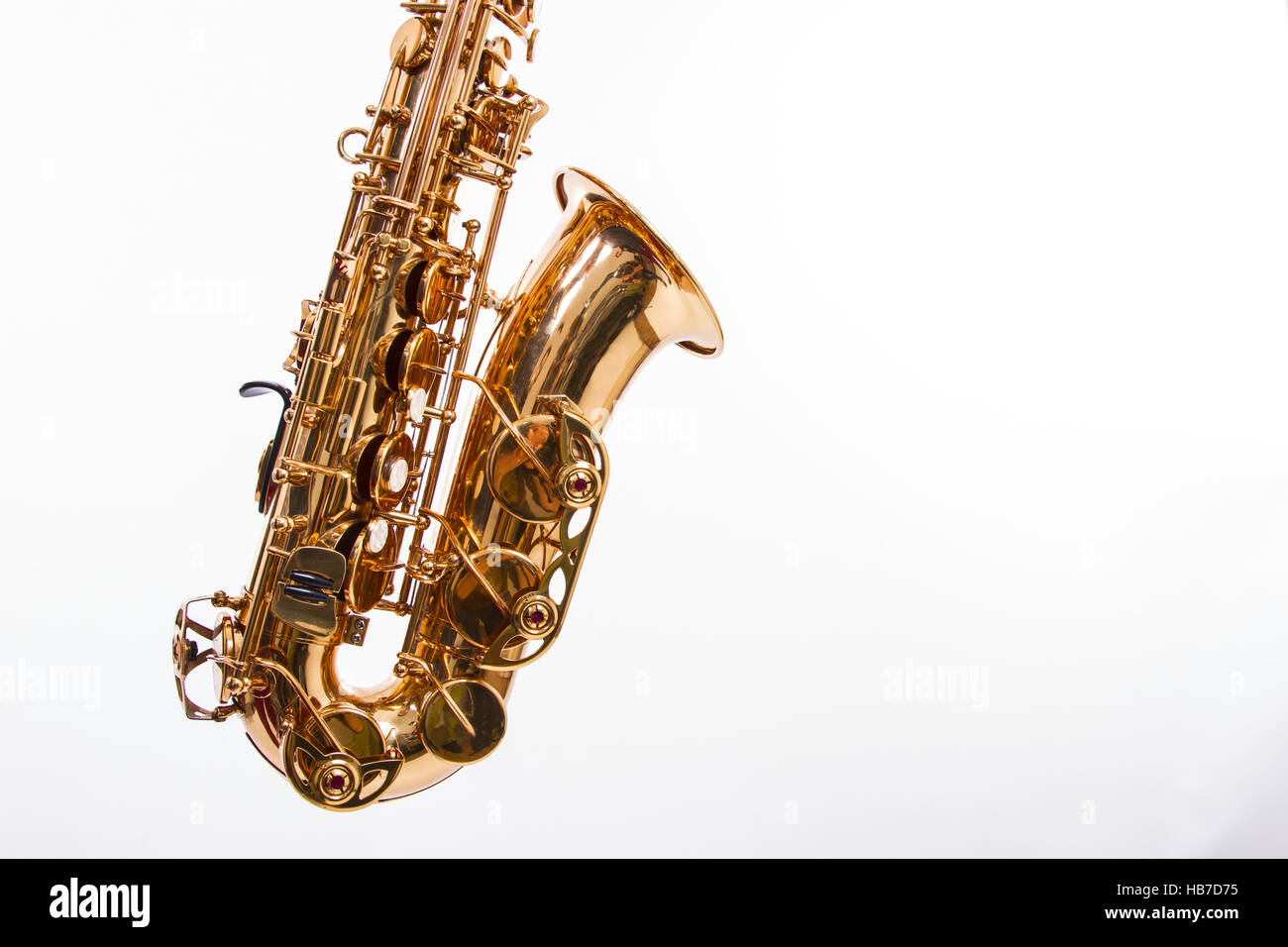 Saxop closeup for a saxophone isolated on white Stock Photo - Alamy