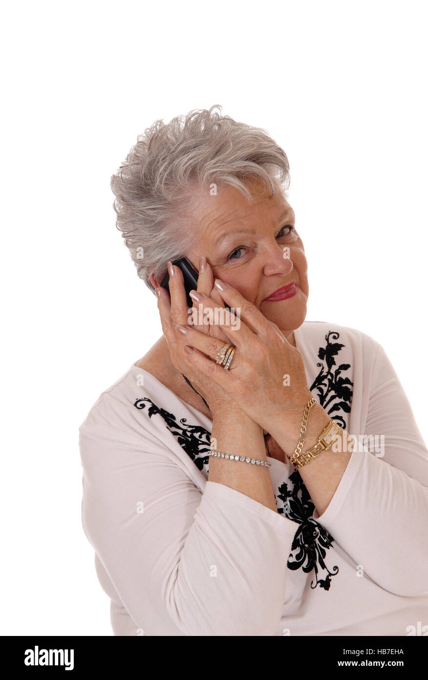 Senior woman talking on her cell phone. Stock Photo