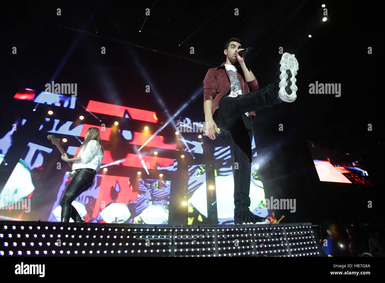 Joe Jonas of DNCE performs on stage at Capital's Jingle Bell Ball with Coca-Cola at London's O2 arena. PRESS ASSOCIATION Photo. Picture date: Sunday 4th December 2016. Photo credit should read: Yui Mok/PA Wire Stock Photo