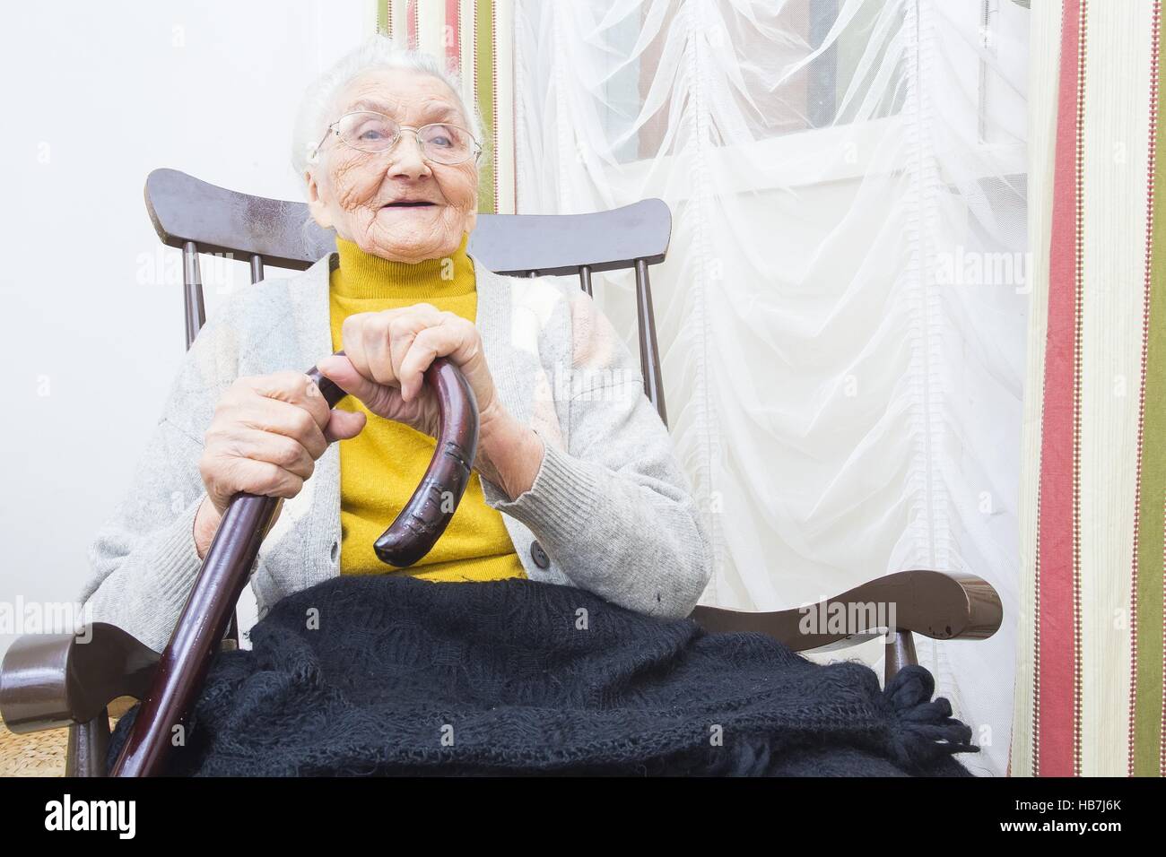 Elderly lady in chair hi-res stock photography and images - Alamy