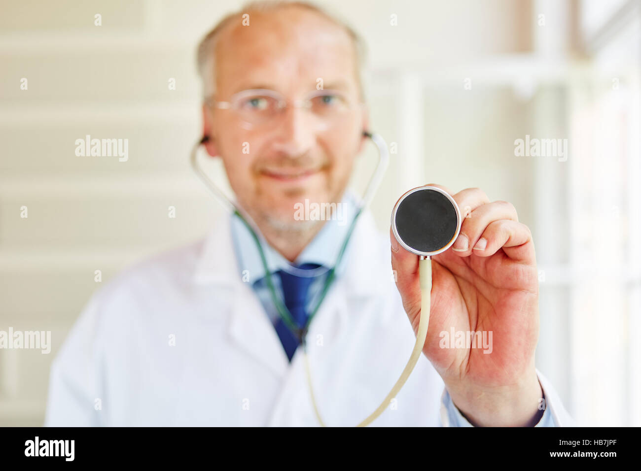 Stethoscope for diagnostics holded by doctor at hospital Stock Photo