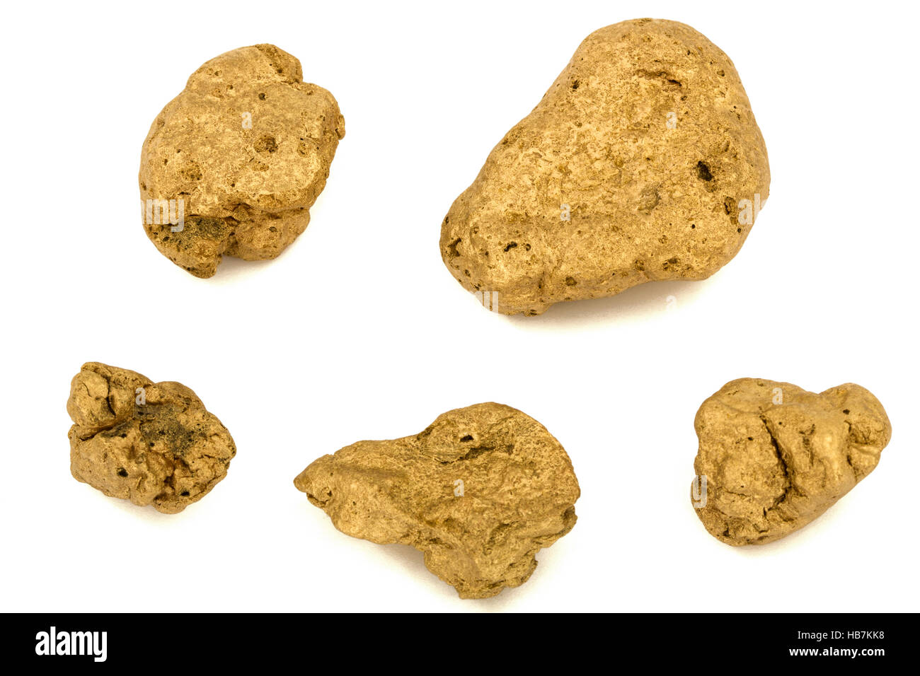 Gold nuggets, isolated on white background Stock Photo - Alamy