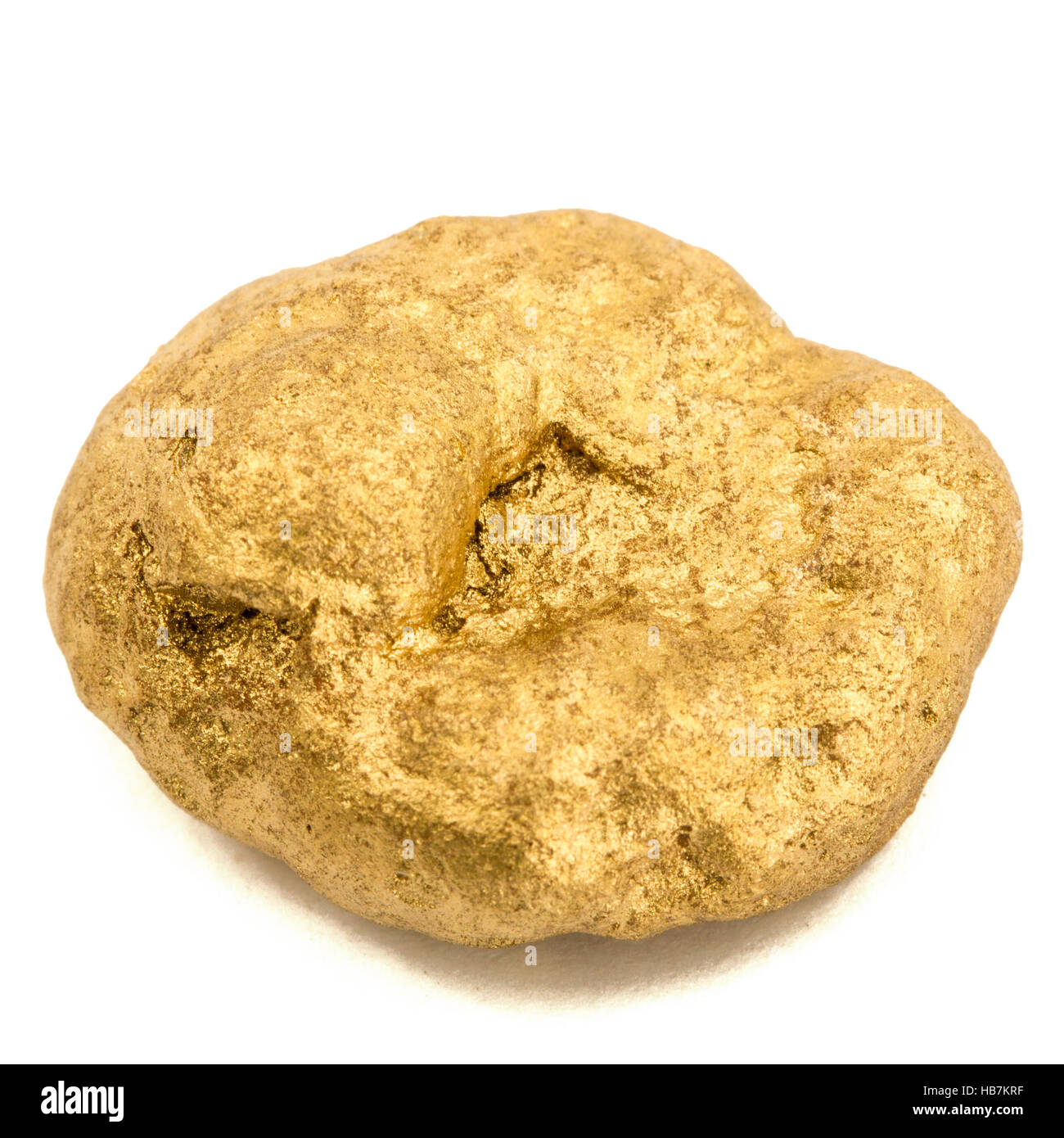 Gold nugget, isolated on white background Stock Photo Alamy