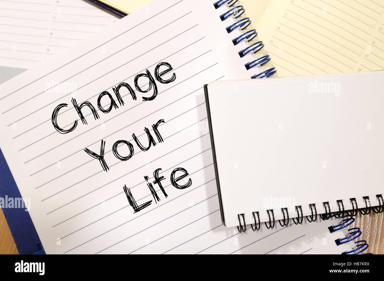 Change your life write on notebook Stock Photo - Alamy