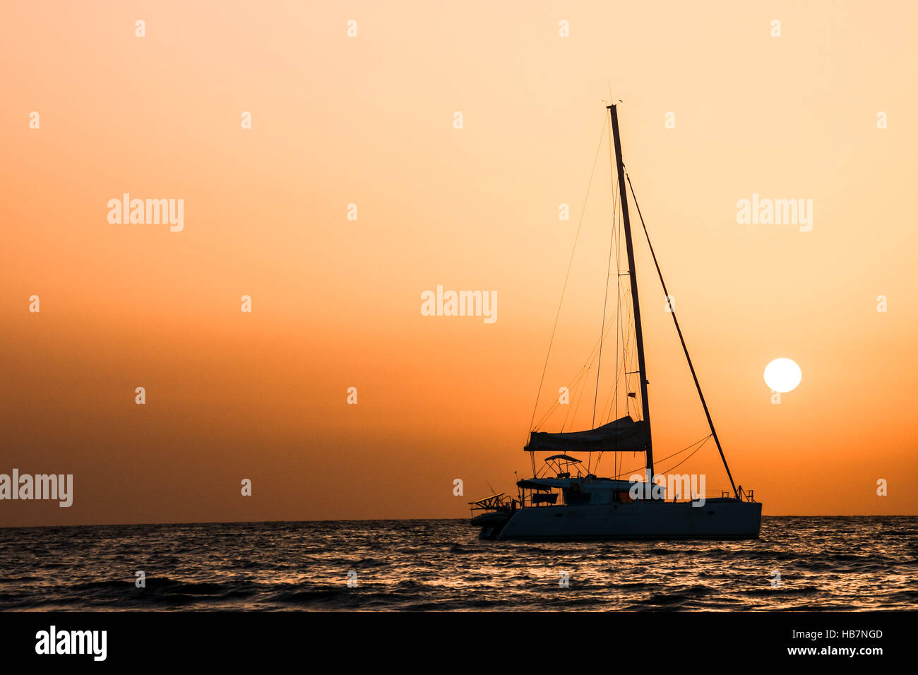 Sail Boat Silhouette at Sunset Stock Photo - Alamy