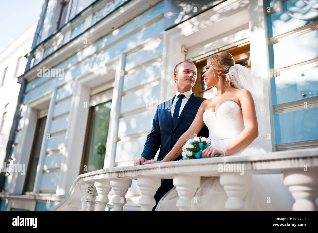 Wedding couple near white classic stairs Stock Photo