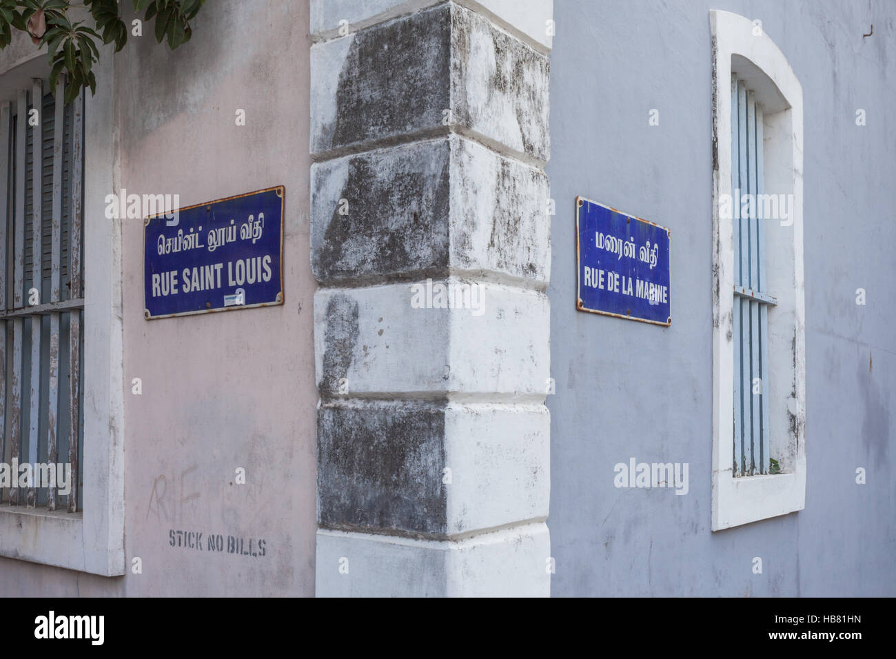 Street corner signs showing English and French (colonial heritage) names on signs, Pondicherry, Puducherry, India Stock Photo