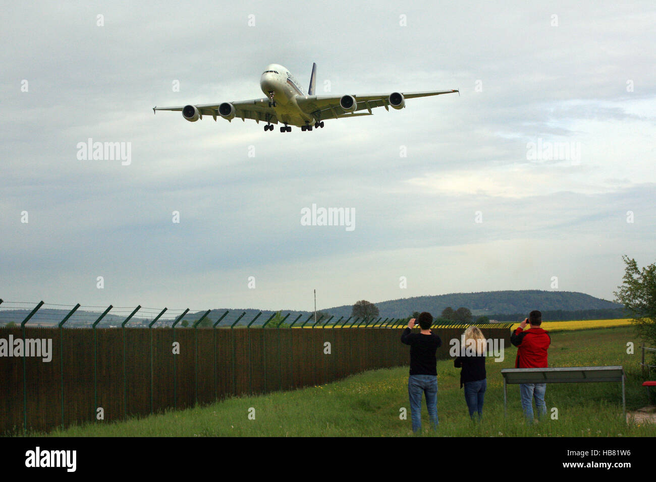 Spotting a landing A380 at zuerich Airport Stock Photo