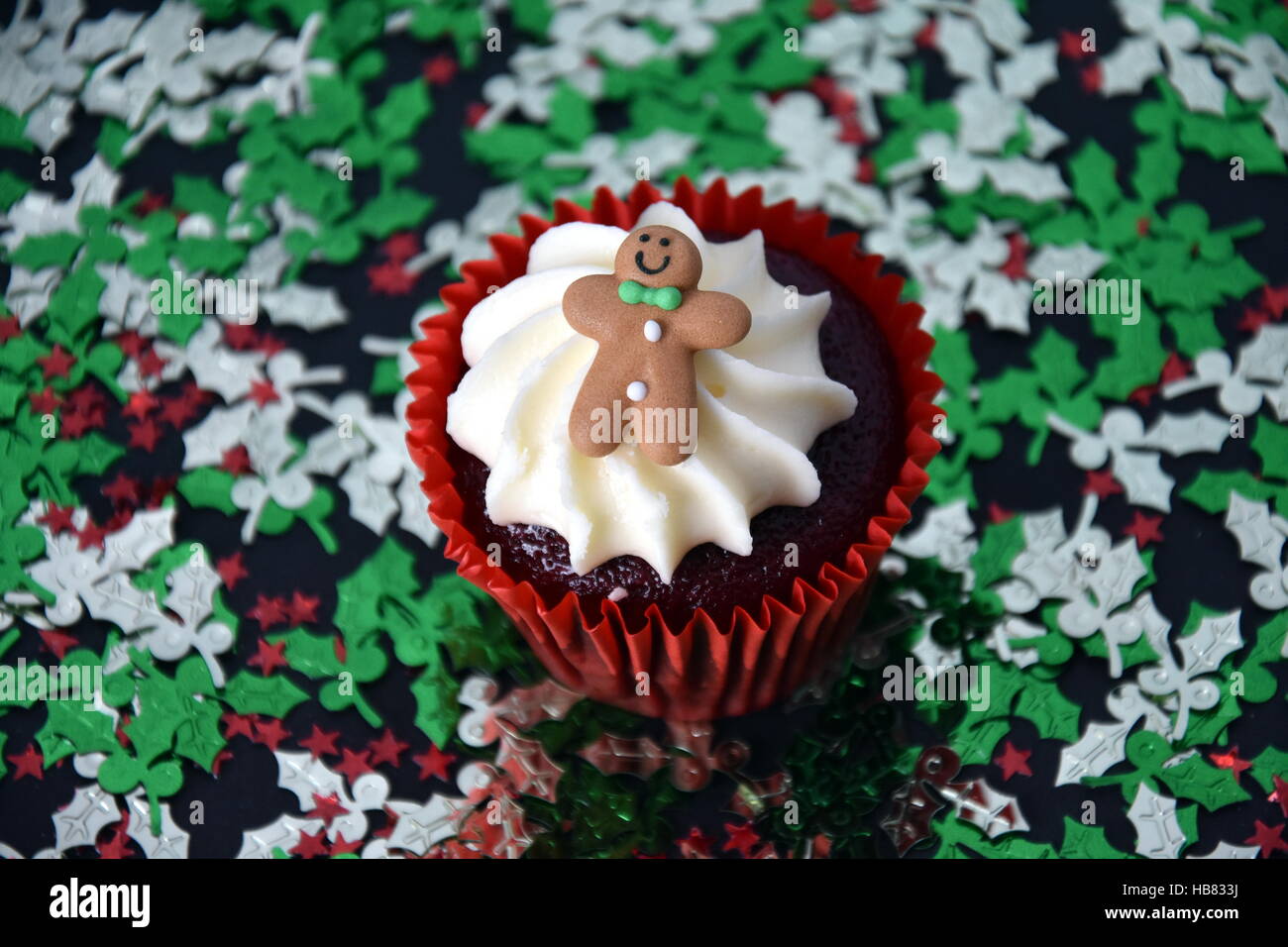 Christmas Cupcake With Gingerbread Man And Whipped Cream Topping