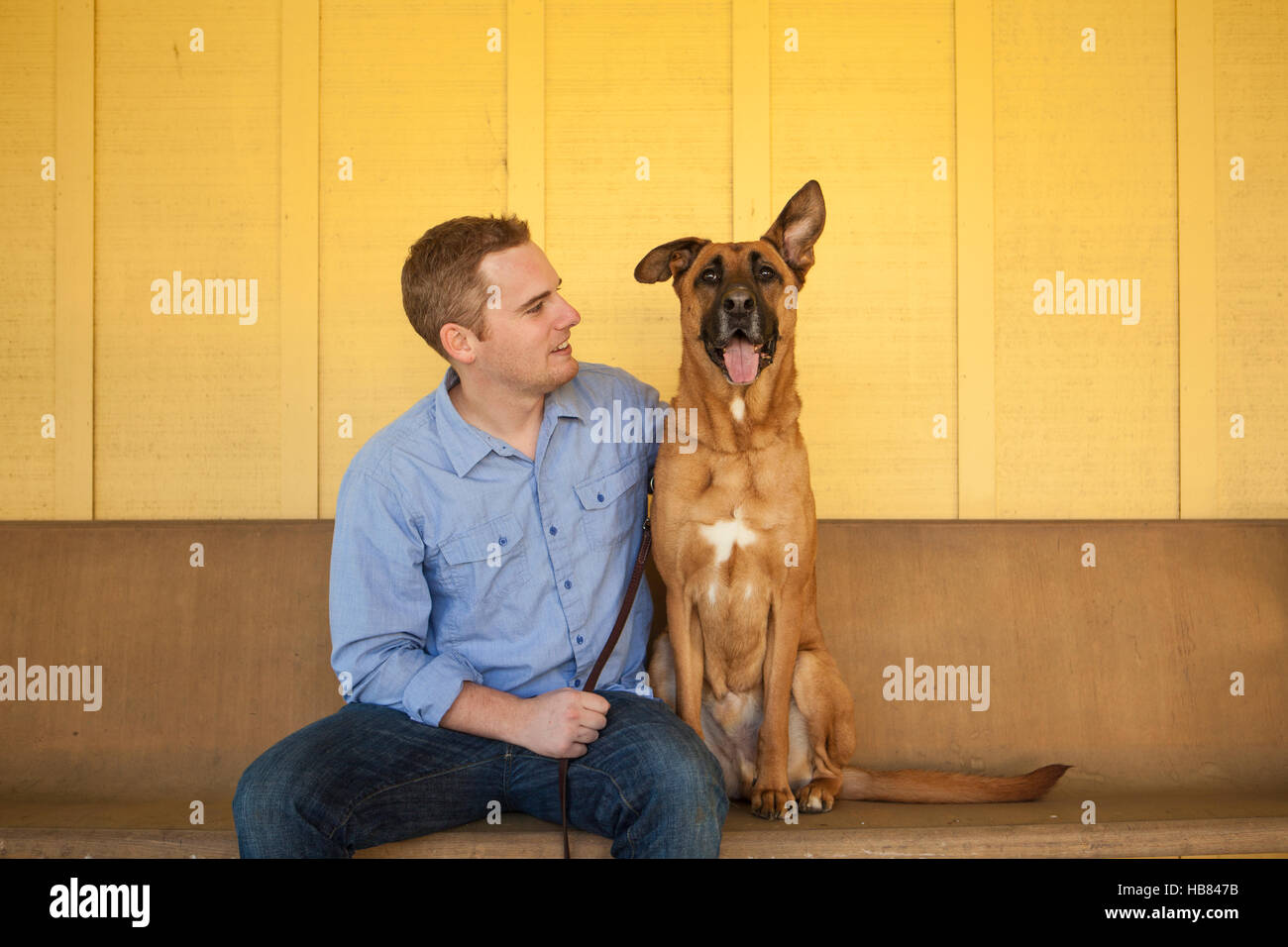 new pet owner and his dog at the Humane Society, Santa Barbara, California Stock Photo