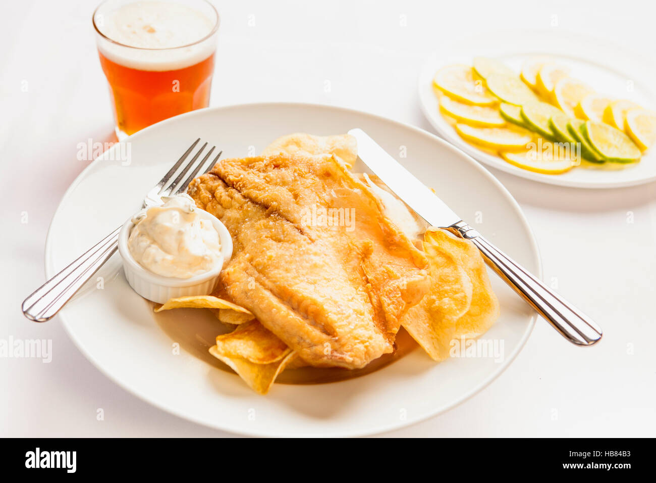 fried Pacific cod with a beer Stock Photo