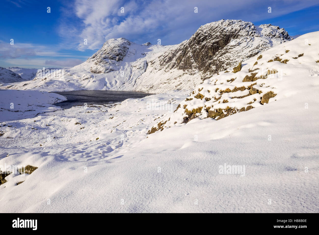 Harrison Stickle, Stickle Tarn & Pavey Ark, English Lake District in winter. Stock Photo