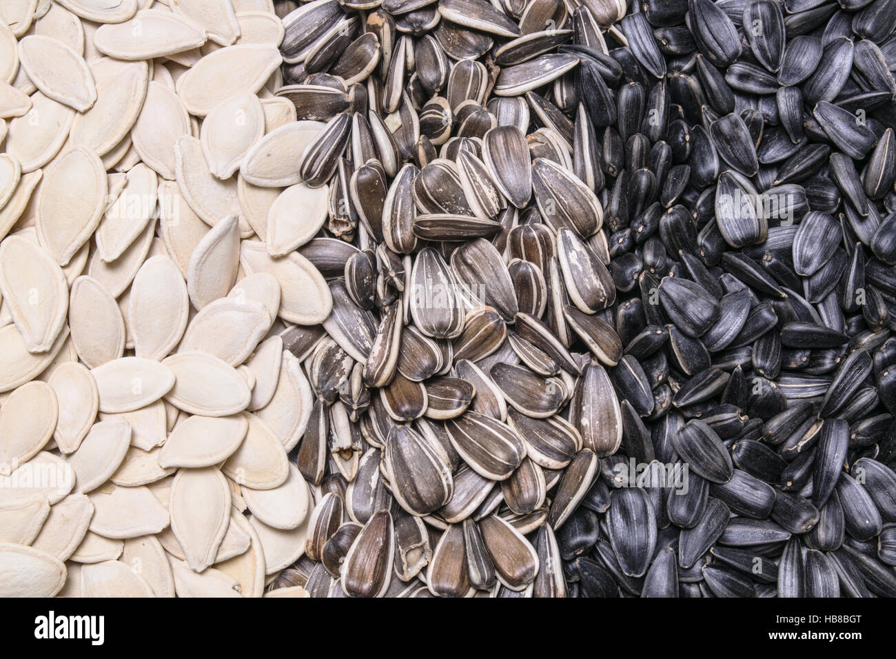 sunflower seeds and pumpkin seeds background, texture Stock Photo - Alamy
