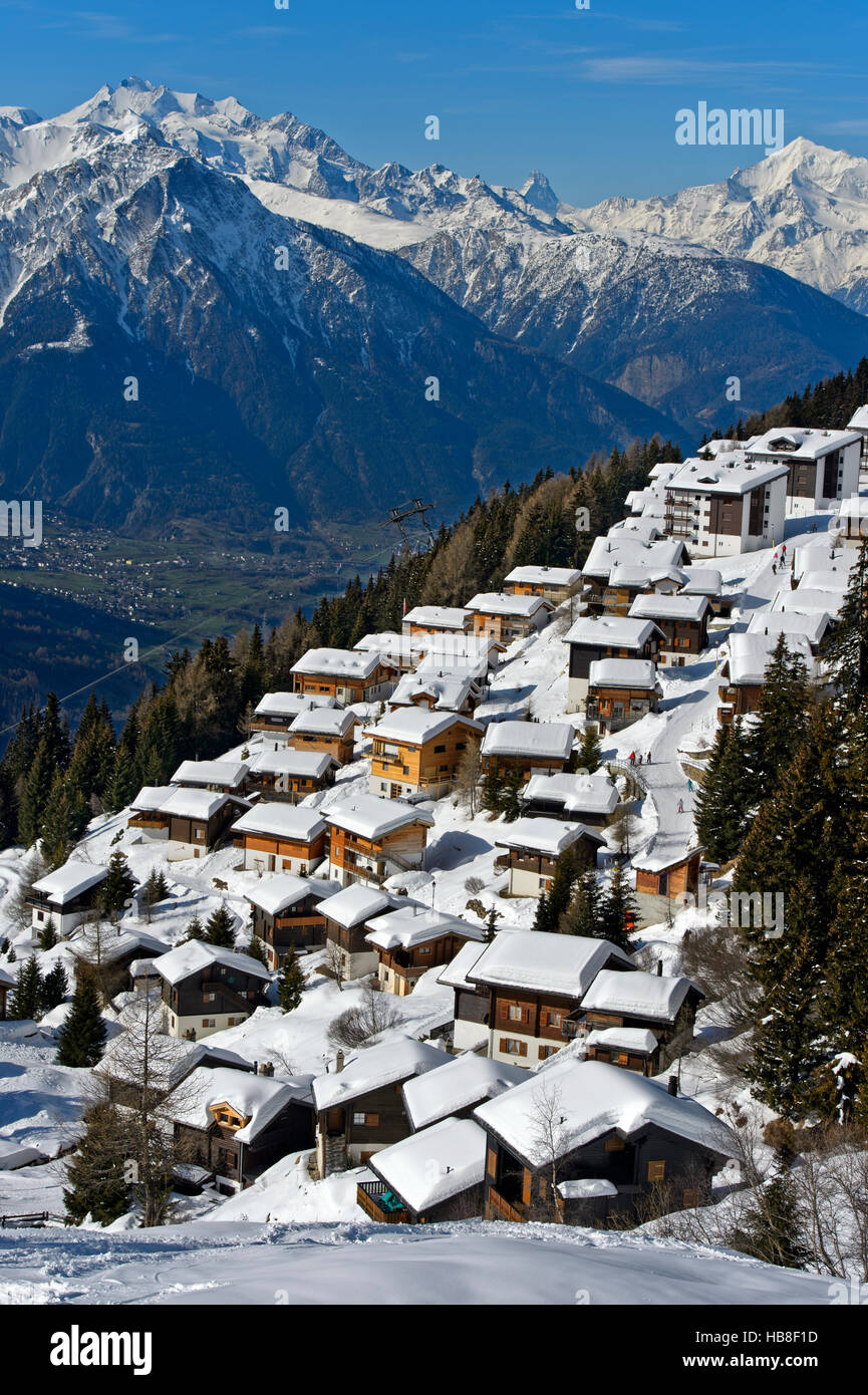 Bettmeralp under a thick blanket of snow, behind Weisshorn, winter, Valais Alps, Valais, Switzerland Stock Photo