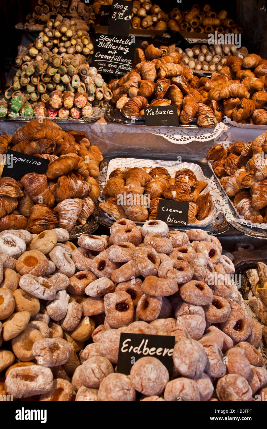 Christmas Fair Market at Ludwigsberg, Germany a booth od traditional German holiday sweets, cookies, rolls and pastries. Stock Photo