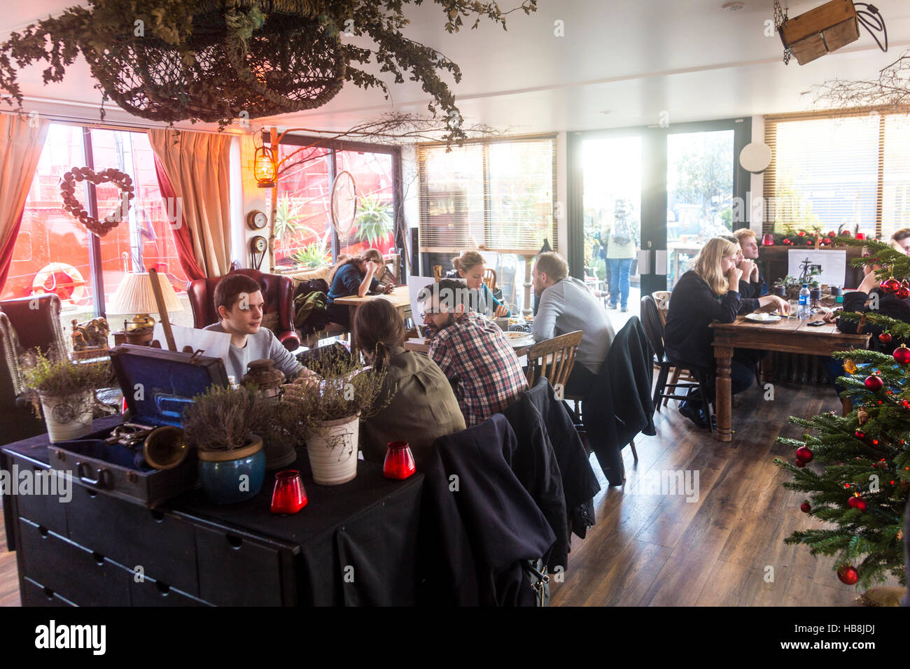 Cosy cafe with eclectic Christmas decor (Bow Creek Cafe, Trinity Buoy Wharf, London, UK) Stock Photo