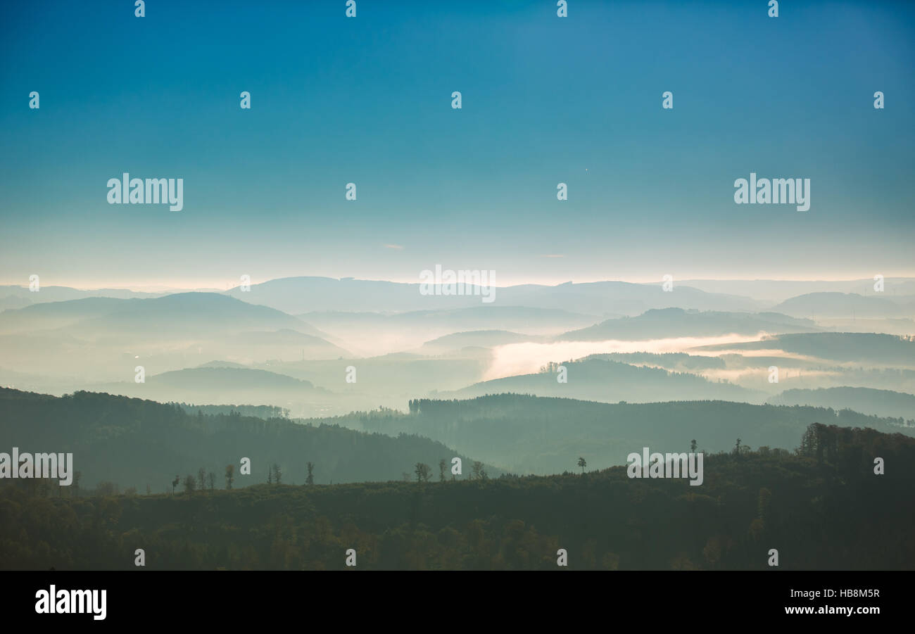 Aerial view, looking at Meschede in the morning mist with Hennesee, Henne lake, Sauerland hills, Meschede, Sauerland, Stock Photo