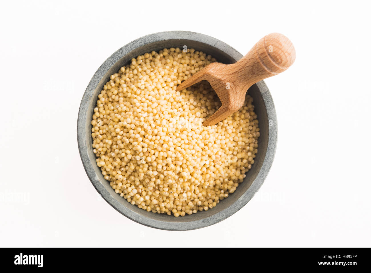 millet groats on white Stock Photo Alamy