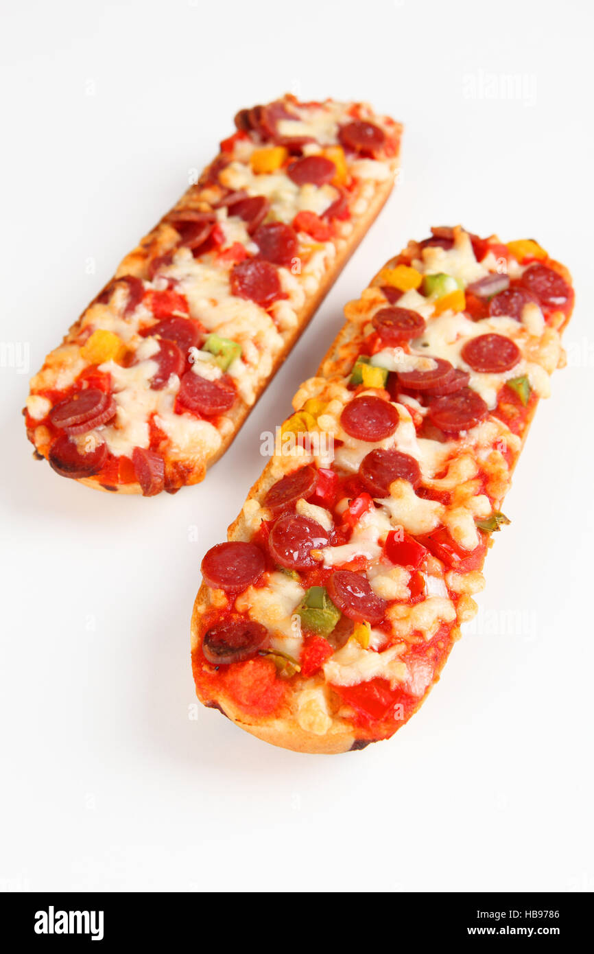 Pizza baguette with salami Stock Photo Alamy