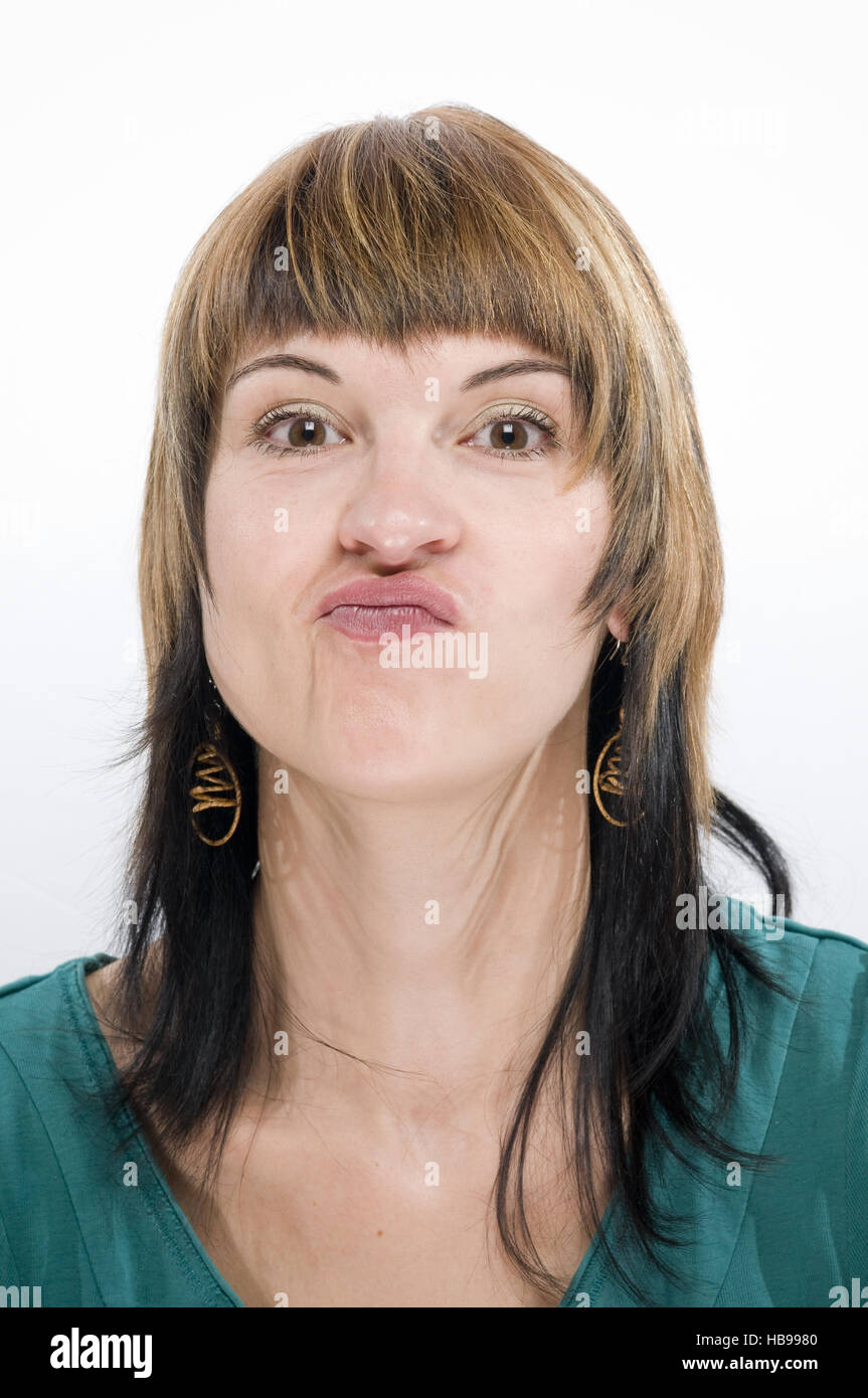 pull a face in the camera Stock Photo