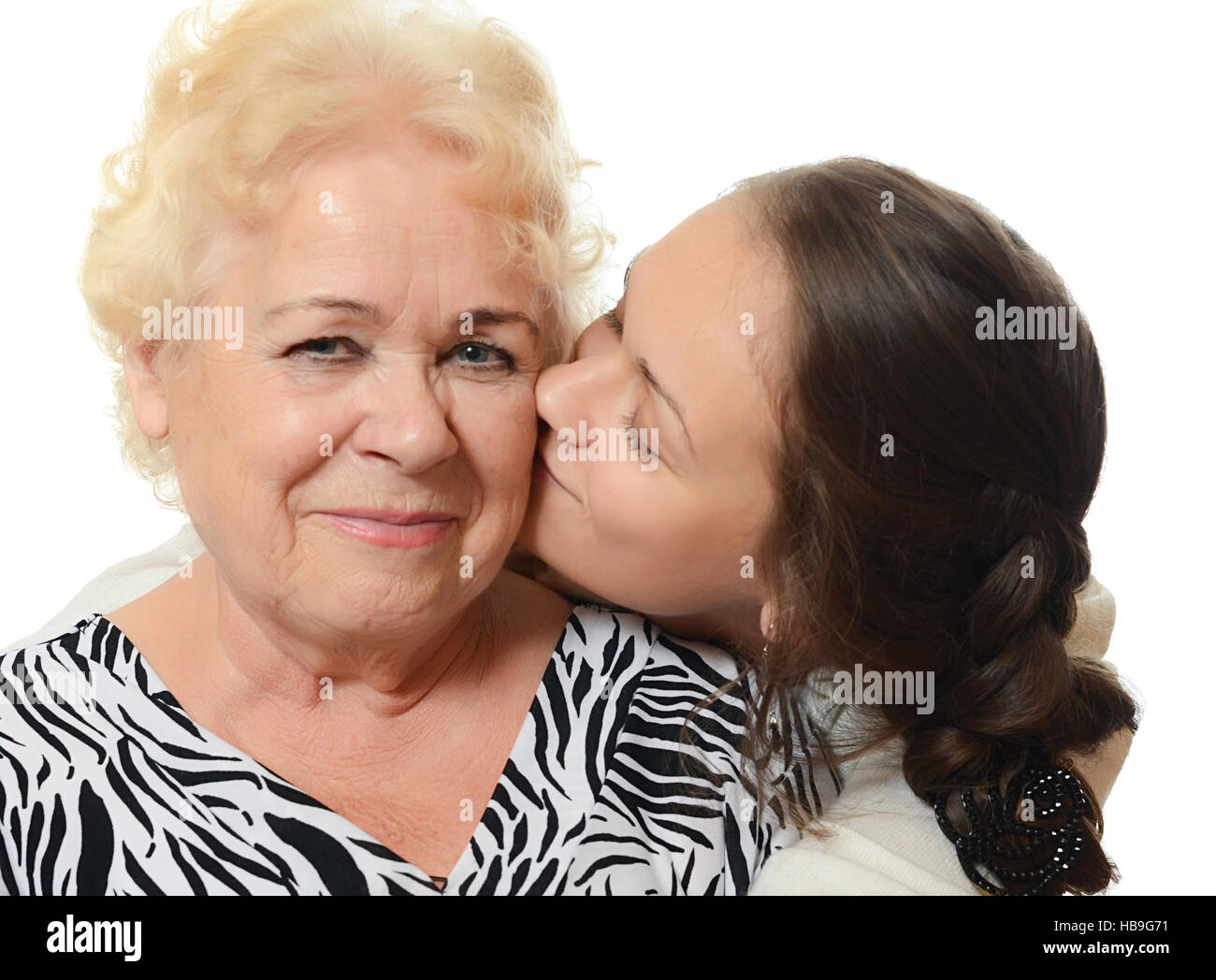 The elderly woman with grand daughter Stock Photo